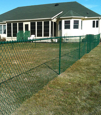 House With Green Fence